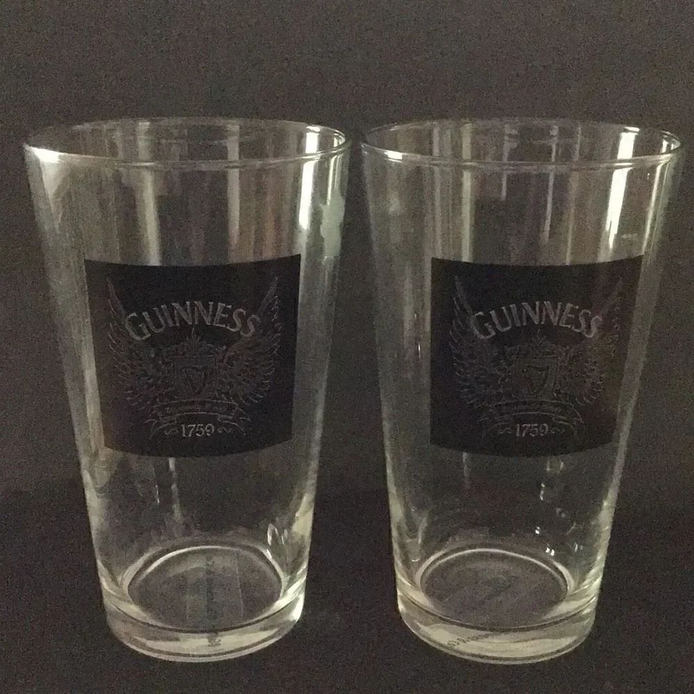 Glasses set Of two Guinness, draft drinking glasses ￼